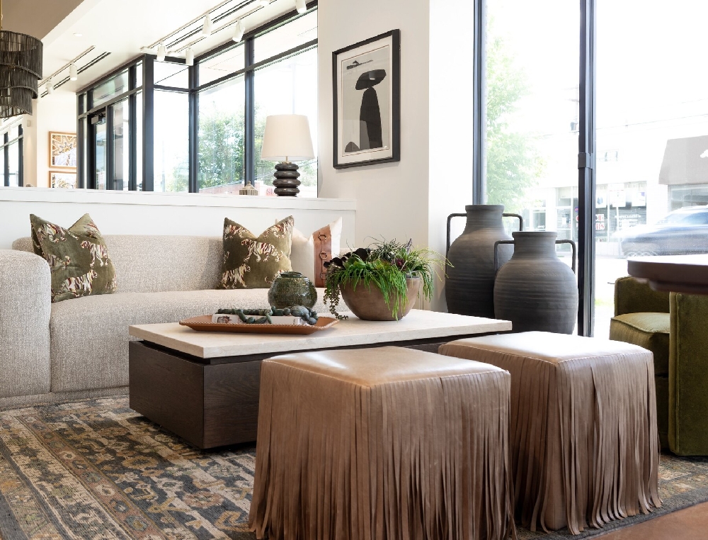 HW Home 9+CO Denver showroom living room vignette with sofa and sculptural ottomans